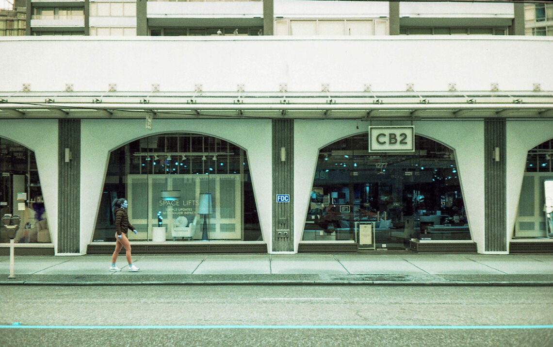 Thomas Guerrero art - shop front with woman walking, green tone